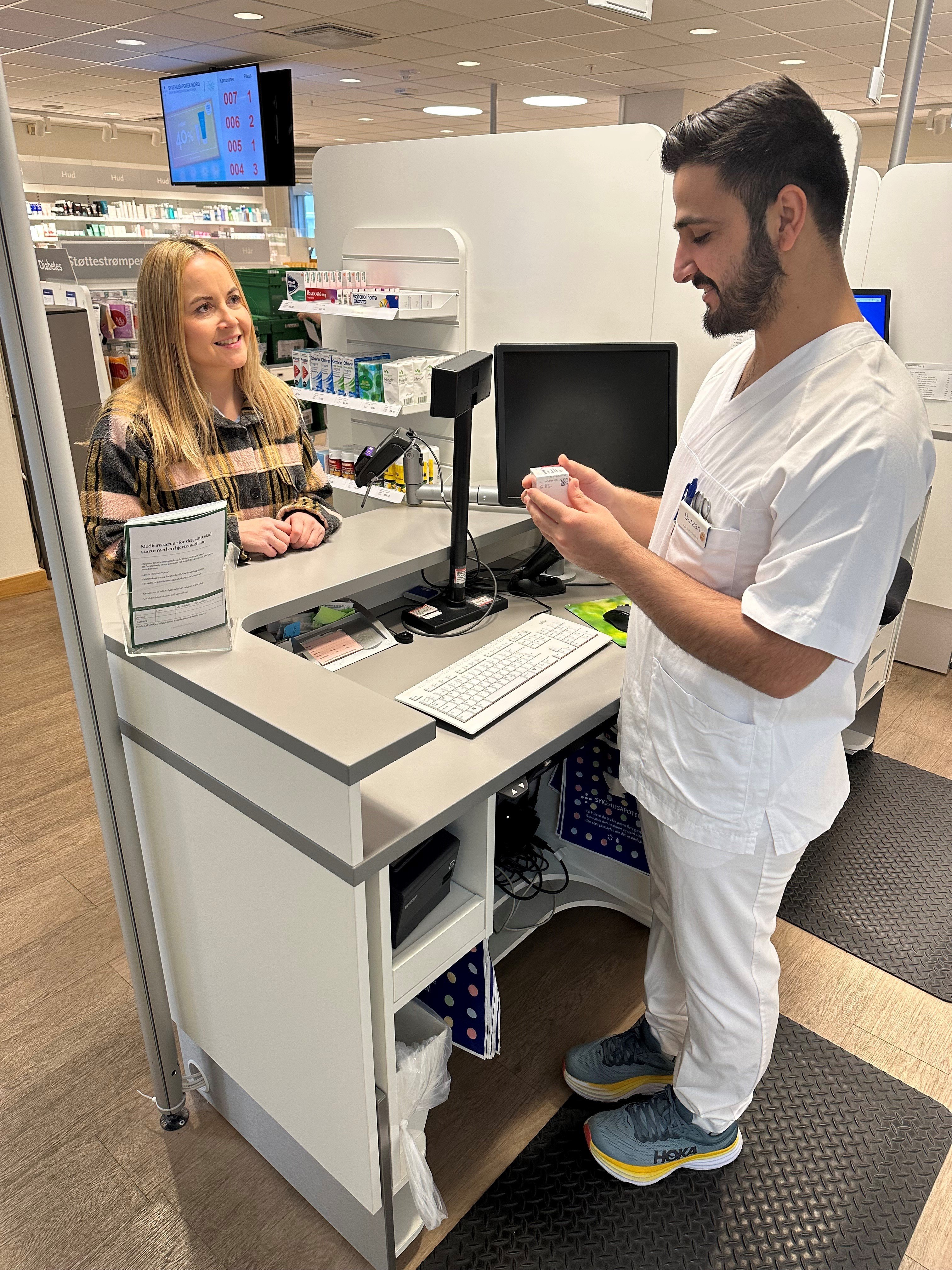 A man and a woman in an office